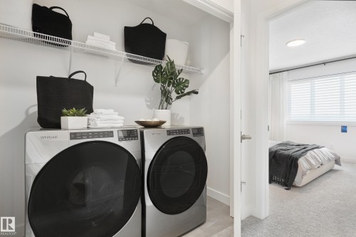 118 Stiles Bend, Leduc, AB - Indoor Photo Showing Laundry Room