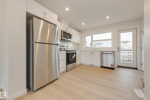 17234 4 Street, Edmonton, AB - Indoor Photo Showing Kitchen With Stainless Steel Kitchen