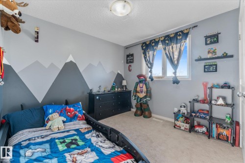51 Silverstone Drive, Stony Plain, AB - Indoor Photo Showing Bedroom