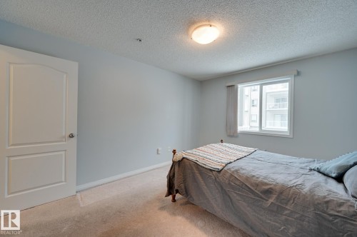 201 155 Edwards Drive, Edmonton, AB - Indoor Photo Showing Bedroom