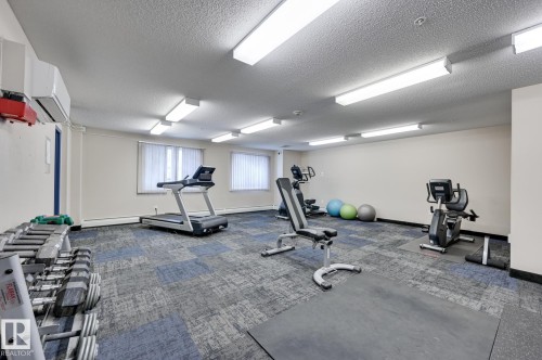 201 155 Edwards Drive, Edmonton, AB - Indoor Photo Showing Gym Room
