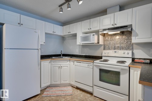 201 155 Edwards Drive, Edmonton, AB - Indoor Photo Showing Kitchen With Double Sink