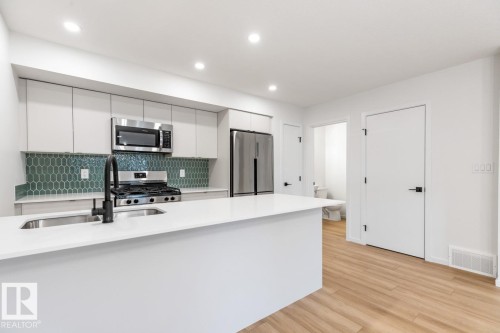 11939, 11941, 11943 101 Street, Edmonton, AB - Indoor Photo Showing Kitchen With Double Sink With Upgraded Kitchen