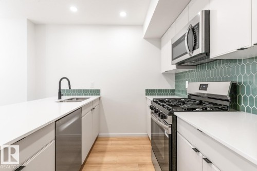 11939, 11941, 11943 101 Street, Edmonton, AB - Indoor Photo Showing Kitchen With Double Sink