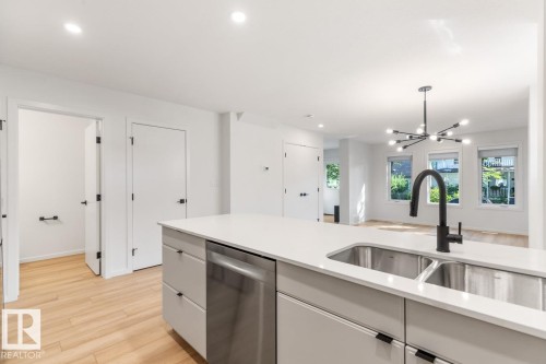 11939, 11941, 11943 101 Street, Edmonton, AB - Indoor Photo Showing Kitchen With Double Sink