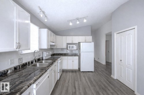 13140 35 Street, Edmonton, AB - Indoor Photo Showing Kitchen With Double Sink