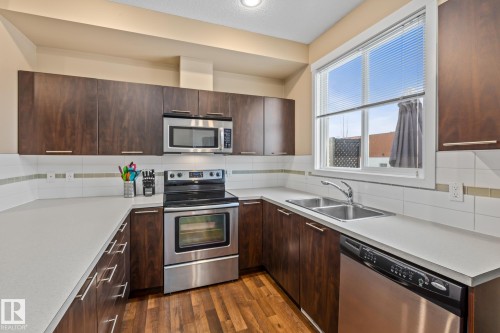 9 6075 Schonsee Way, Edmonton, AB - Indoor Photo Showing Kitchen With Double Sink