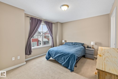 9 6075 Schonsee Way, Edmonton, AB - Indoor Photo Showing Bedroom