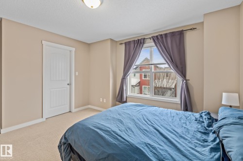 9 6075 Schonsee Way, Edmonton, AB - Indoor Photo Showing Bedroom