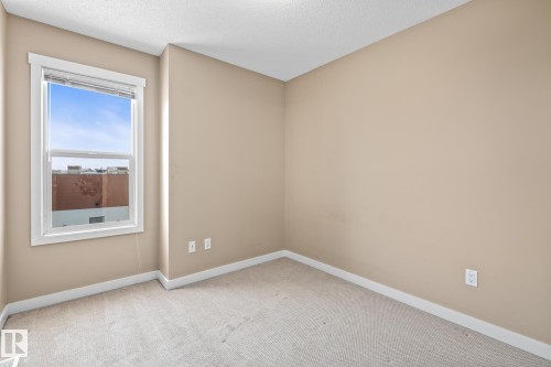 9 6075 Schonsee Way, Edmonton, AB - Indoor Photo Showing Other Room