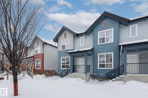 9 6075 Schonsee Way, Edmonton, AB - Outdoor With Facade