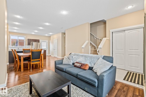 9 6075 Schonsee Way, Edmonton, AB - Indoor Photo Showing Living Room