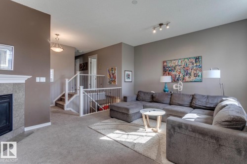 4109 Charles Link Link, Edmonton, AB - Indoor Photo Showing Living Room With Fireplace