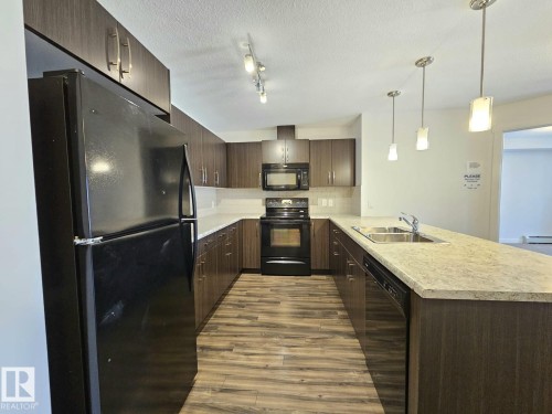 205 3670 139 Avenue, Edmonton, AB - Indoor Photo Showing Kitchen With Double Sink With Upgraded Kitchen