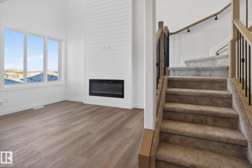 155 Pierwyck Loop, Spruce Grove, AB - Indoor Photo Showing Other Room With Fireplace
