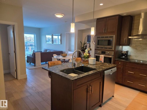 718 200 Bellerose Drive, St. Albert, AB - Indoor Photo Showing Kitchen With Double Sink