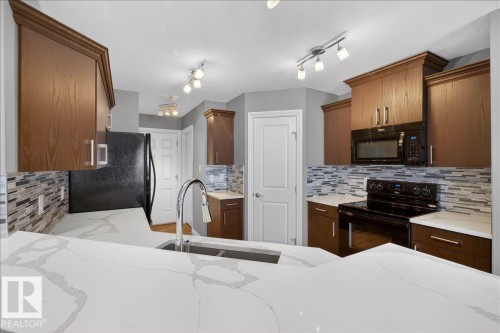 30 Aurea Bay, Spruce Grove, AB - Indoor Photo Showing Kitchen With Double Sink