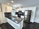 117 5521 7 Avenue, Edmonton, AB  - Indoor Photo Showing Kitchen With Stainless Steel Kitchen With Double Sink 