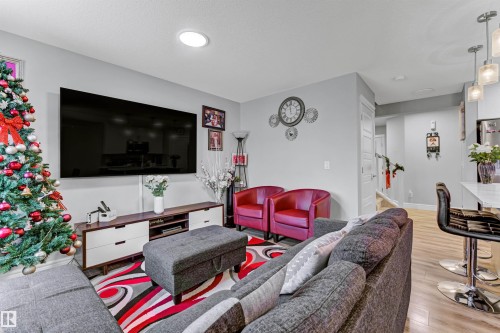 7637 Koruluk Place, Edmonton, AB - Indoor Photo Showing Living Room
