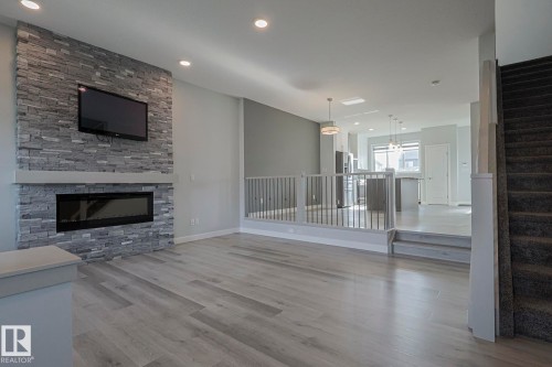 1653 Plum Circle Circle, Edmonton, AB - Indoor Photo Showing Living Room With Fireplace