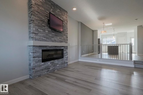 1653 Plum Circle Circle, Edmonton, AB - Indoor Photo Showing Living Room With Fireplace