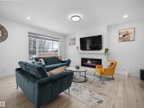 949 Stillwater Boulevard, Edmonton, AB - Indoor Photo Showing Living Room With Fireplace