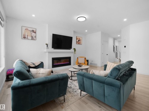 949 Stillwater Boulevard, Edmonton, AB - Indoor Photo Showing Living Room With Fireplace