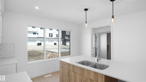 17510 5A Street, Edmonton, AB - Indoor Photo Showing Kitchen With Double Sink