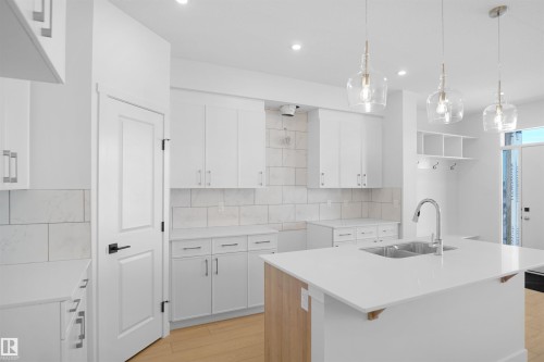 17506 5A Street, Edmonton, AB - Indoor Photo Showing Kitchen With Double Sink With Upgraded Kitchen