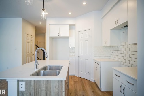 17632 4 Street, Edmonton, AB - Indoor Photo Showing Kitchen With Double Sink