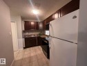 4 3823 76 Street, Edmonton, AB  - Indoor Photo Showing Kitchen With Double Sink 