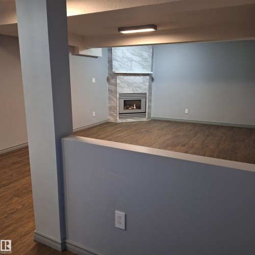 893 Birch Avenue, Sherwood Park, AB - Indoor Photo Showing Other Room With Fireplace