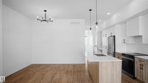 20605 42 Avenue, Edmonton, AB - Indoor Photo Showing Kitchen With Upgraded Kitchen