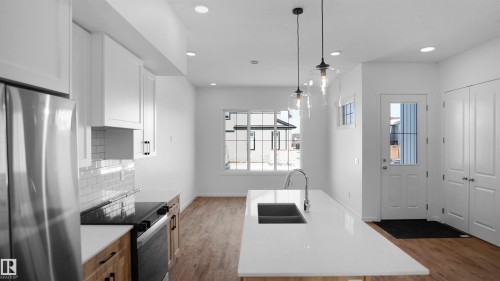 20605 42 Avenue, Edmonton, AB - Indoor Photo Showing Kitchen With Double Sink With Upgraded Kitchen