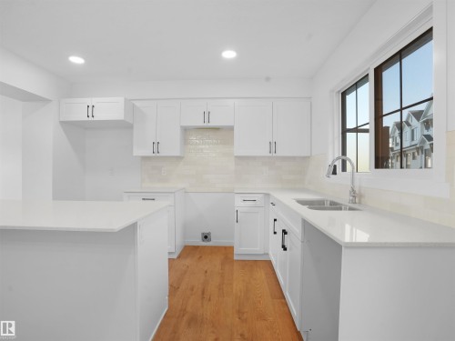 67 525 Secord Boulevard, Edmonton, AB - Indoor Photo Showing Kitchen With Double Sink