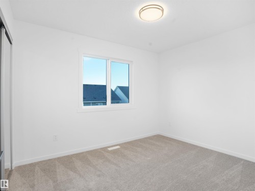 67 525 Secord Boulevard, Edmonton, AB - Indoor Photo Showing Other Room