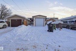 View of front of home with an outbuilding - 