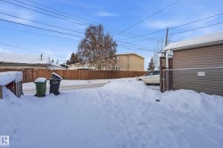View of yard layered in snow - 
