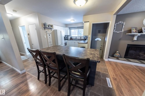 10792 165 Street, Edmonton, AB - Indoor Photo Showing Dining Room With Fireplace