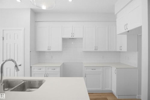 20940 16 Avenue, Edmonton, AB - Indoor Photo Showing Kitchen With Double Sink