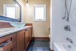 Full bath featuring vanity and bathtub / shower combination - 