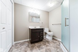 Full bathroom featuring a stall shower and vanity - 