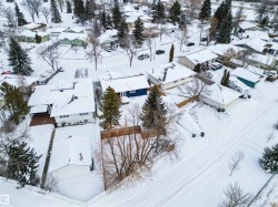 Snowy aerial view featuring a residential view - 