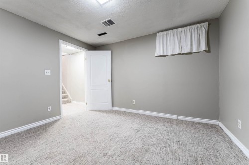 37 Apache Crescent, Leduc, AB - Indoor Photo Showing Other Room
