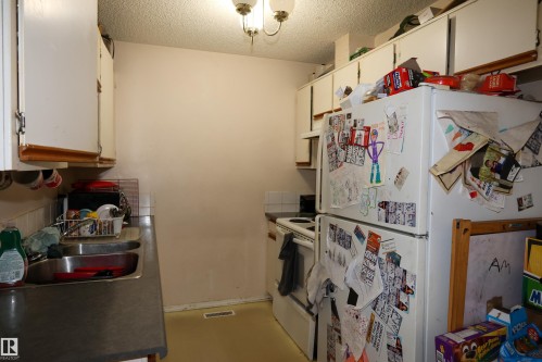 9704 104 Street, Morinville, AB - Indoor Photo Showing Laundry Room