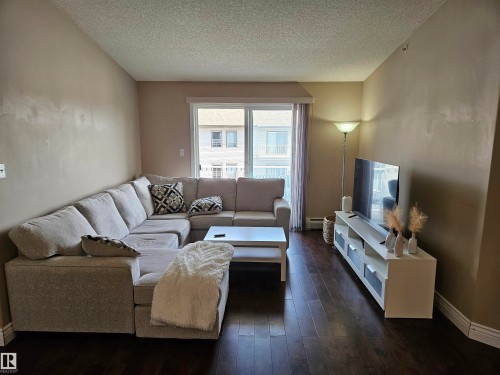 403 155 Edwards Drive, Edmonton, AB - Indoor Photo Showing Living Room