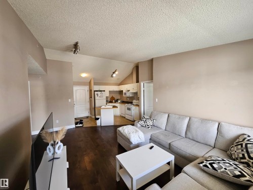 403 155 Edwards Drive, Edmonton, AB - Indoor Photo Showing Living Room