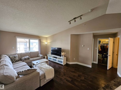403 155 Edwards Drive, Edmonton, AB - Indoor Photo Showing Living Room