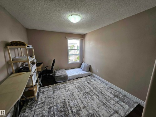 403 155 Edwards Drive, Edmonton, AB - Indoor Photo Showing Bedroom