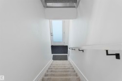 Stairs with carpet and baseboards - 